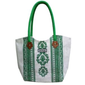 White laminated jute tote bag with green botanical print and cotton handles